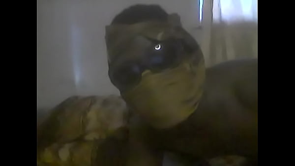 Nigerian gay boy fucking his ass with candle stick.