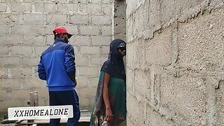 Big-titted Nigerian slut fucking in an uncompleted building.